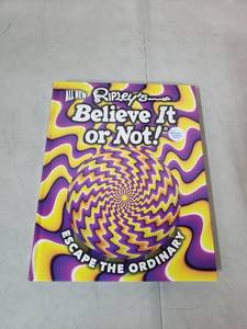 lot 2569 image: Ripleys Believe It Or Not Escape The Ordinary Hardcover Book