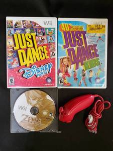 lot 46 image: (3) Nintendo Wii Games And Red Controller