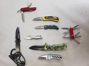 lot 82 image: Pocket Knifes Including Tac-Force, Avalanche, And A Swiss Army Knife