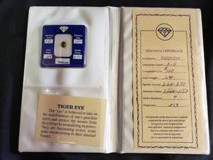 lot 93 image: Certified Tigers Eye And Other Precious Stones