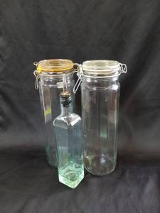 lot 100 image: (2) 25Tall 4 Wide Glass Bail Lid Canister & Italian Glass Olive Oil Bottle With Stainless Steel Pourer