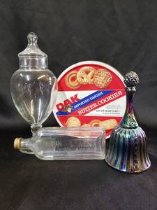 lot 106 image: Fenton Art Glass Amethyst Carnival Faberge Bell 1977, Clear Glass Apothecary Jar with Lid 10 Tall, Vintage DAK Cookie Tin vintage 16oz, Vintage Embossed Glass Medical Bottle Sloan Linimen Made in the USA