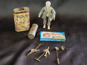 lot 130 image: Lord of The Rings Action Figure Bilbo Baggins, Airplane Tie Tacks, Vintage Doans Tin, Tire Repair Kit, Hasbro Dollys Nurse Kit