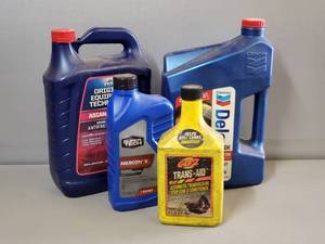 lot 133 image: Unopened Antifreeze & Transmission Fluid, Mostly Full Diesel Oil, Mostly Full Trans-Aid