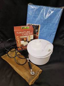 lot 145 image: Vinyl Tablecover, Furniture Care Kit, Salad Spinner, Two Bottle Wine Rack, Wine Bag, Melon Baller
