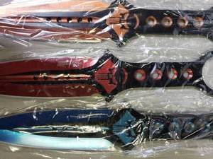 lot 149 image: NEW In Box Punisher Icon Throwing Knives, Umarex 40XP CO2 BB Pistol, Metal Slide, Black WSilver Slide With 3 Cartridges