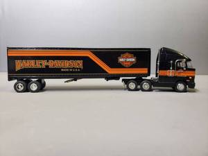 lot 153 image: Harley Davidson Tractor Trailer Locking Coin Bank Die Cast Limited Rare