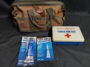 lot 176 image: Bucket Boss Tool Bag, First Aid Kit, Permatex Superglue, Permatex Blue RTV Silicone