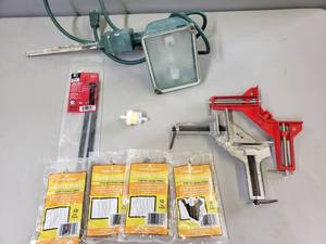 lot 192 image: 3 Corner Vices (2), Heavy Duty Zip Ties, Flood Light, Fabric Pins