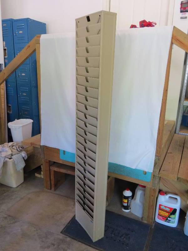 lot 14 image: 64 x 12 Metal Magazine Rack