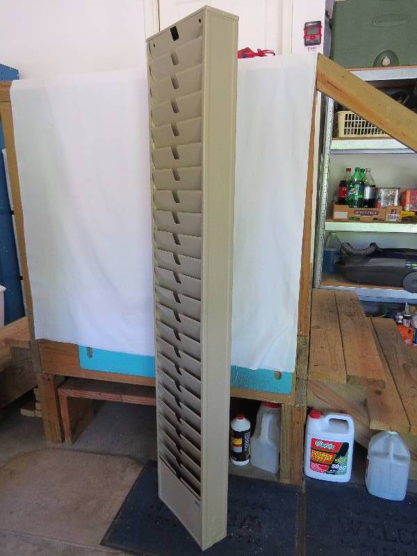 lot 15 image: 64 x 12 Metal Magazine Rack