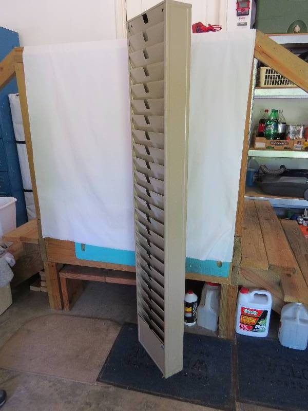 lot 16 image: 64 x 12 Metal Magazine Rack