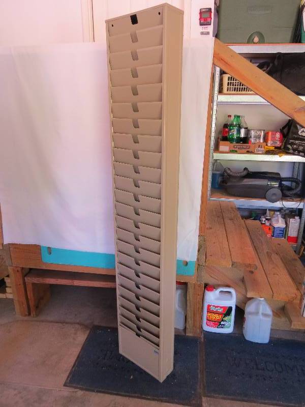 lot 18 image: 64 x 12 Metal Magazine Rack