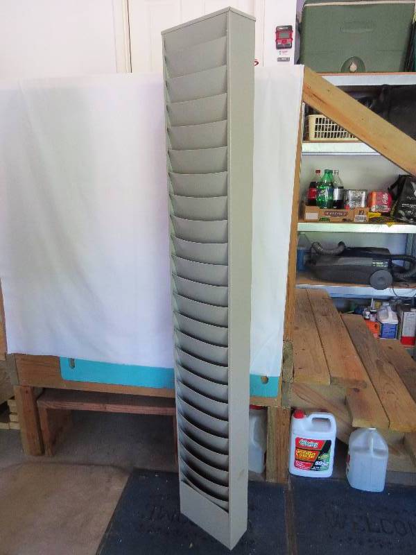 lot 19 image: 65 x 10 Metal Magazine Rack