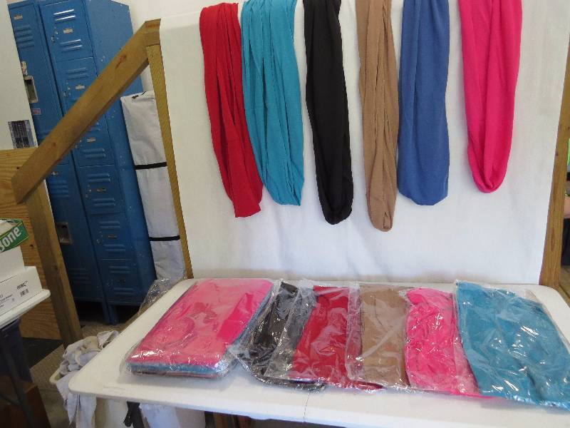 lot 69 image: Lot of 23 Infinity Scarves with Hidden Pocket (assorted colors)