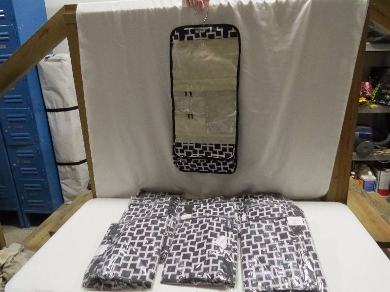 lot 94 image: Lot of 12 Black Geometric HangingTravel Cosmetic Bags