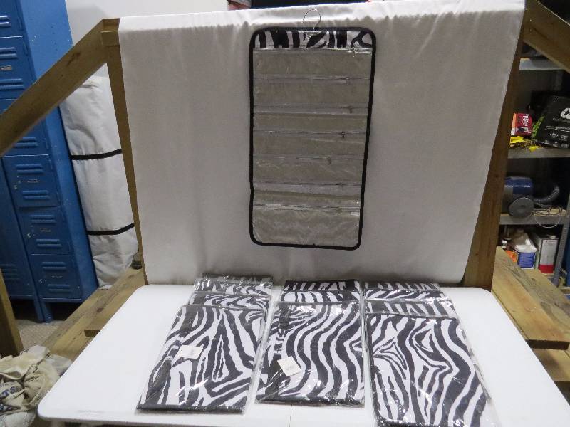 lot 98 image: Lot of 12 BlackWhite Zebra HangingTravel Jewelry Rolls