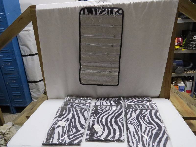 lot 99 image: Lot of 12 BlackWhite Zebra HangingTravel Jewelry Rolls