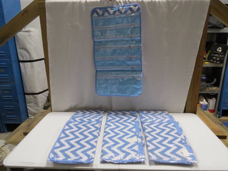 lot 105 image: Lot of 12 Light Blue HangingTravel Jewelry Rolls