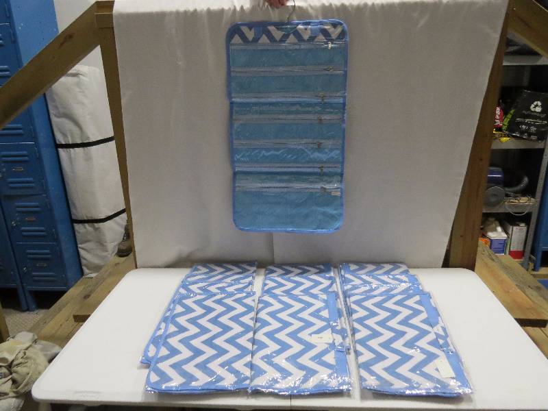 lot 107 image: Lot of 12 Light Blue HangingTravel Jewelry Rolls