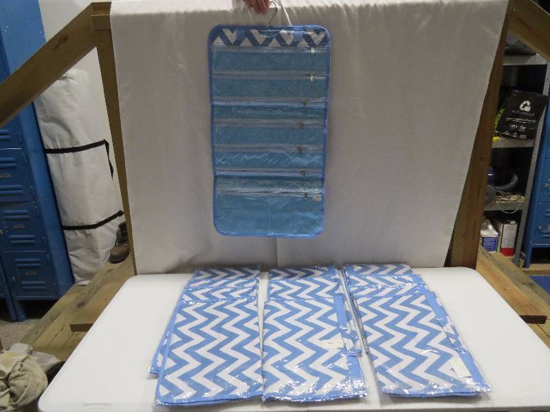 lot 111 image: Lot of 12 Light Blue HangingTravel Jewelry Rolls