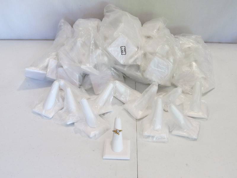 lot 161 image: Lot of 96 White Leatherette Single Ring Stands (jewelry not included)