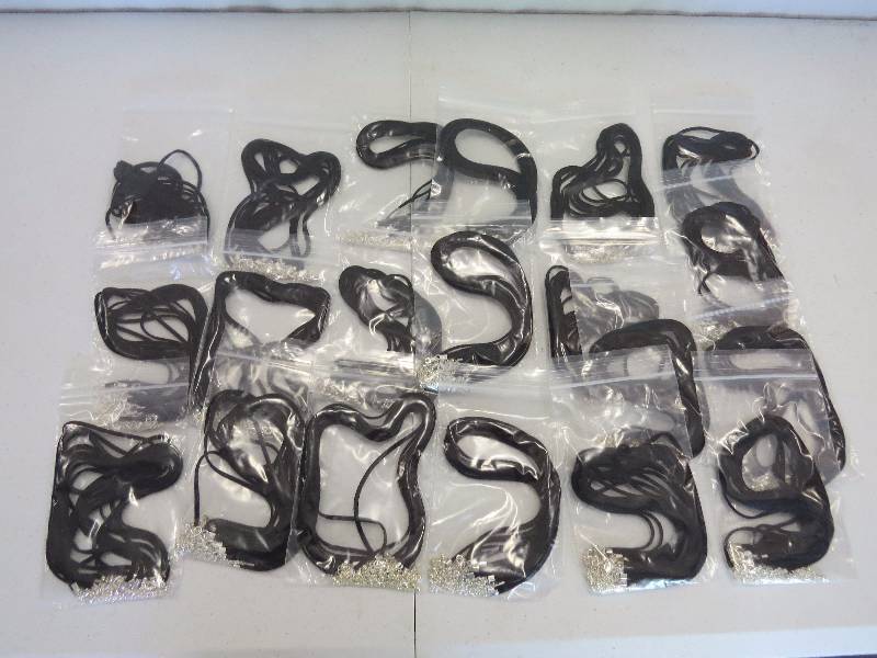lot 207 image: Lot of 200 15 Black Faux Suede Necklaces