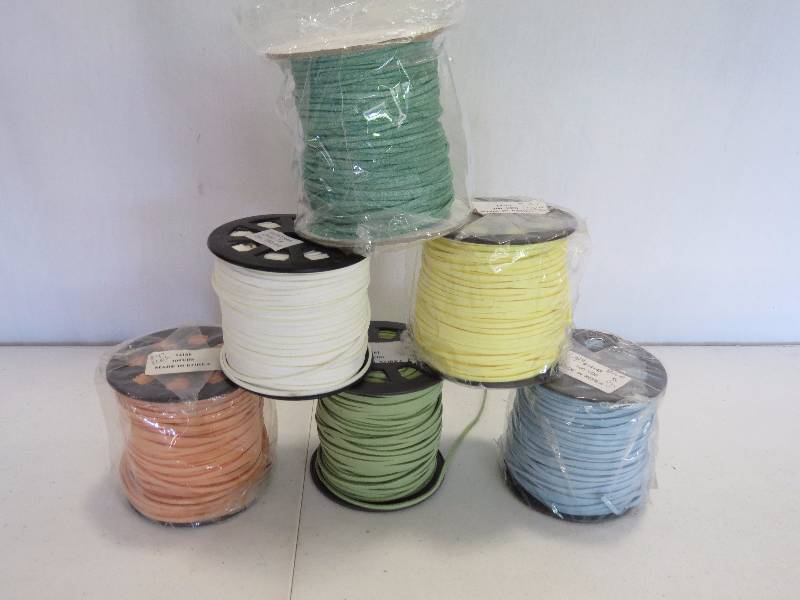 lot 279 image: Lot of 6 100 yard spools of faux suede cord
