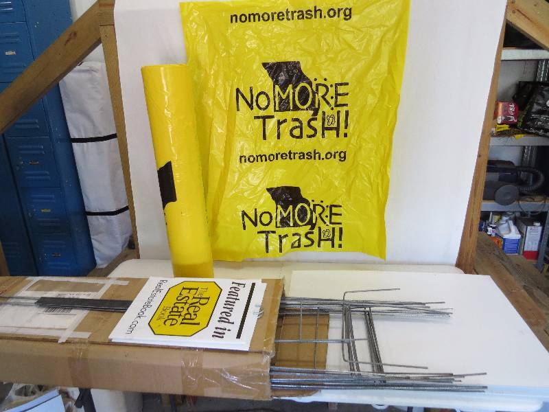 lot 313 image: Trash Bags and Yard Signs