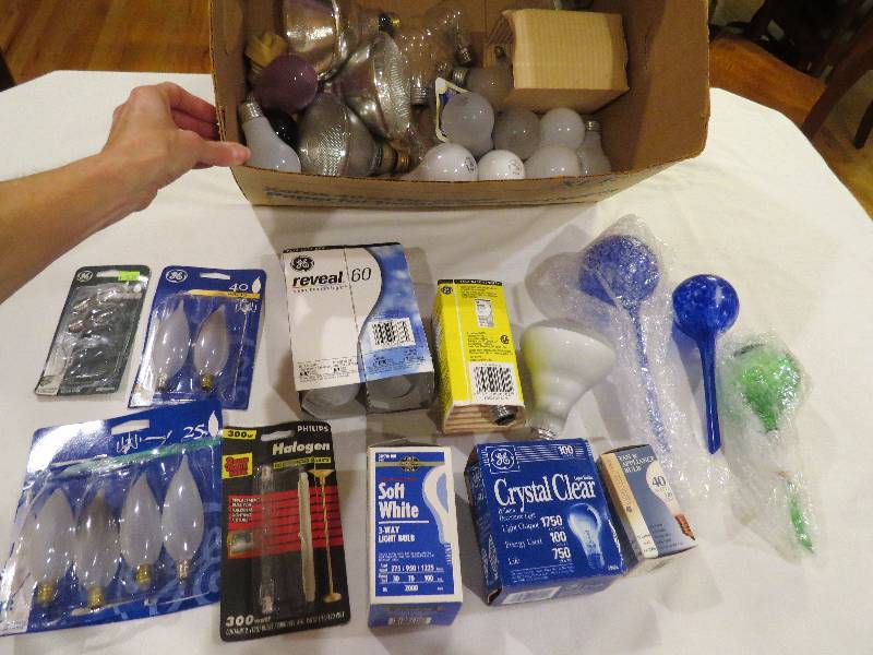 lot 341 image: Box full of assorted light bulbs and glass watering bulbs