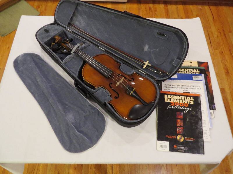 lot 360 image: Viola with case and music books