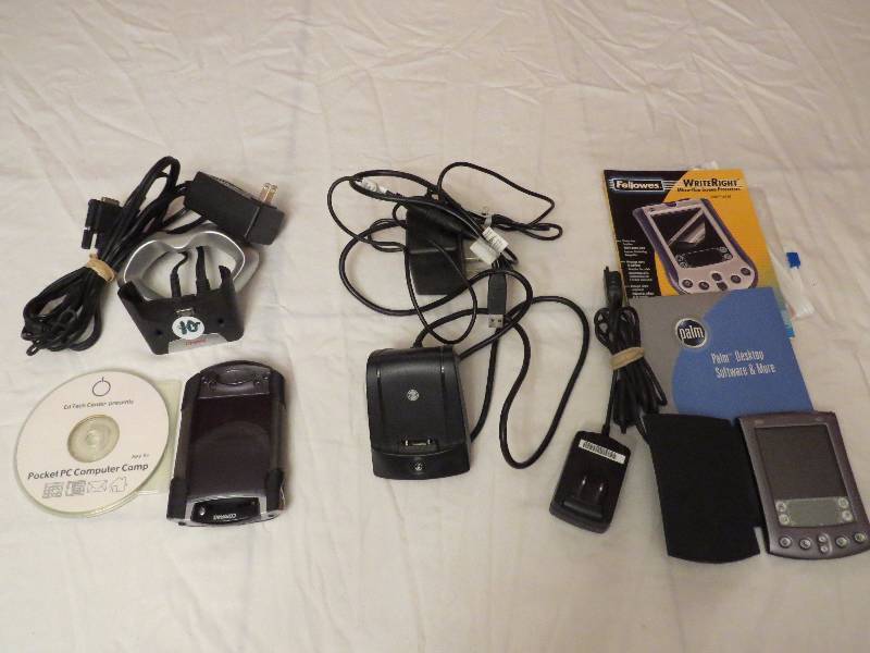 lot 370 image: Compaq Pocket PC and Palm M515