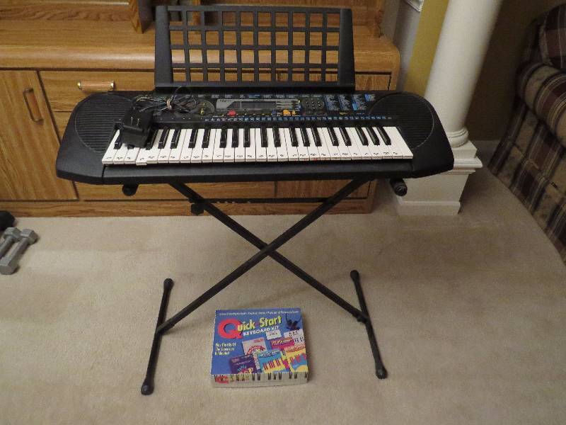 lot 394 image: Electronic Piano Keyboard wstand and more
