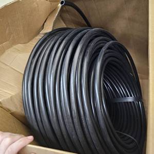 lot 45543 image: Roll of Black Plastic Tubing