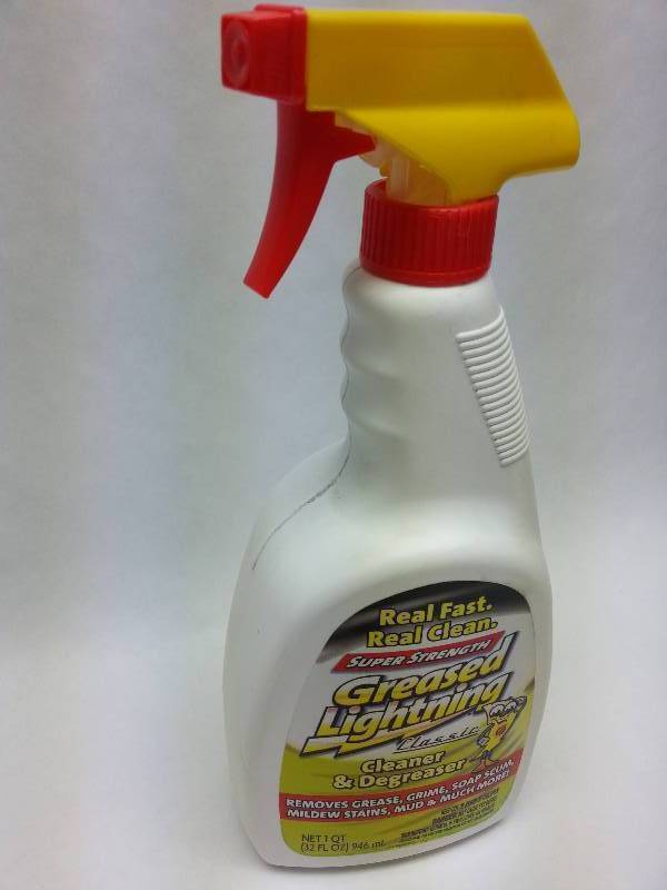 lot 8881 image: A big 32 Oz bottle of the Good Stuff Greased Lightning cleaner and degreaser with adjustable spray nozzle.