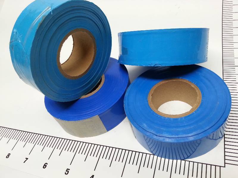 lot 8766 image: 4 rolls 60 foot of Blue plastic 1 wide marking tape (no adhesive) Kind of a baby Blue in color