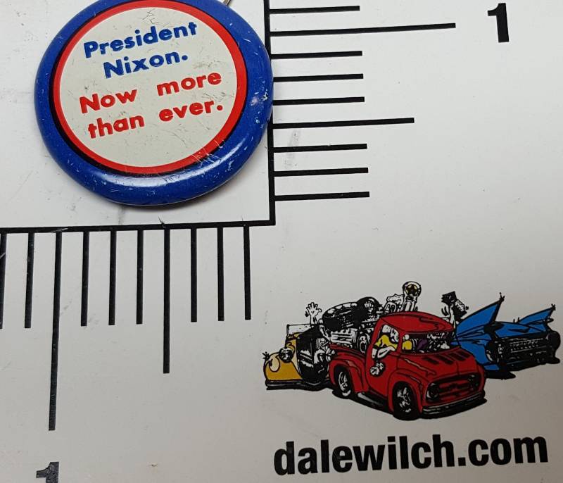 lot 7476-3 image: 1972 President Nixon Now more than ever. metal Red, White and Blue hat or lapel pin. Measures about 1 OD