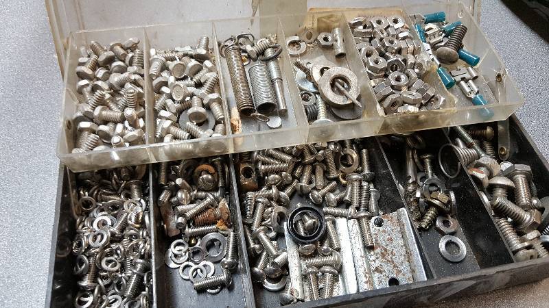 lot 7495 image: Small parts organizer loaded with small parts.  Stainless screws, nuts and more.
