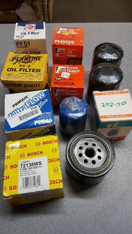 lot 7598 image: 11 new assorted automotive oil filters.  If youre in the business, make a nice deal here for the inventory