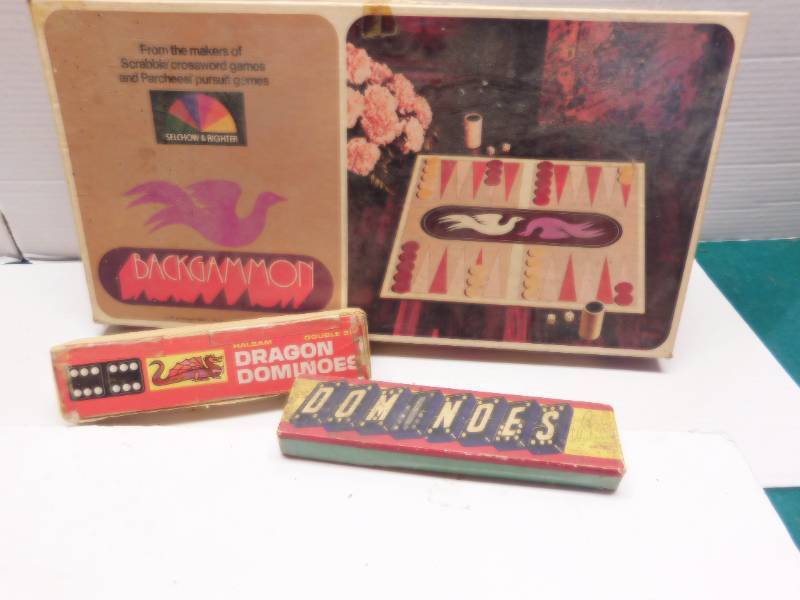 lot 12122 image: Vintage packs of Dominos &  Vintage Selchow &Righter Backgammon game.