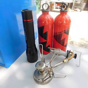 lot 8062 image: Whisper Light BackPackers stove and Fuel Containers