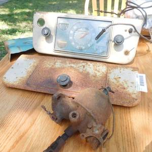 lot 8023 image: Studebaker Dashboard Gauge Cluster. Studebaker Glove Box Front Panel.