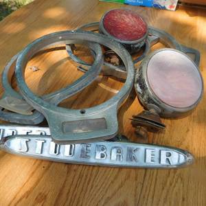 lot 8057 image: Antique Studebaker Headlight� Rings & Emblems