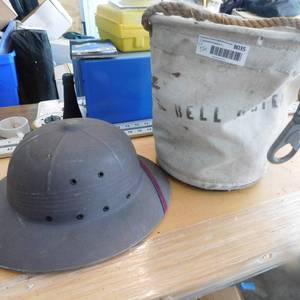 lot 8035 image: Vintage Linemans Bag and Tropical Helmet