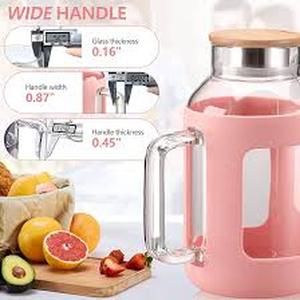 lot 6640 image: WINSA Glass Pitcher with Lid and Spout, 64 oz Glass Water Pitcher with Thickened Ergonomic Handle, Stainless Steel Lid & Precise Scale Line for Iced Tea Juice Coffee Milk, BPA Free - Pink