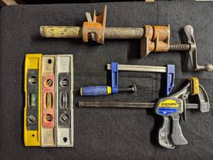 lot 648 image: (3) Levels and Clamps.