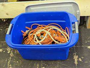 lot 717 image: Bucket With Extension Cords