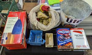 lot 721 image: Gloves, Miller Lite Bucket, Empty Advertisement Tins, Outlet Boxes.