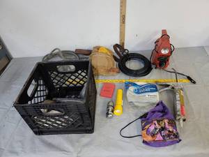 lot 525 image: Tool belt  flash light  plastic crate & caulking gun