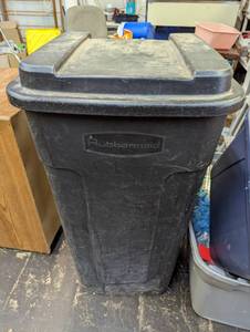 lot 768 image: 50 Gallon Outdoor Trashcan and Contents.